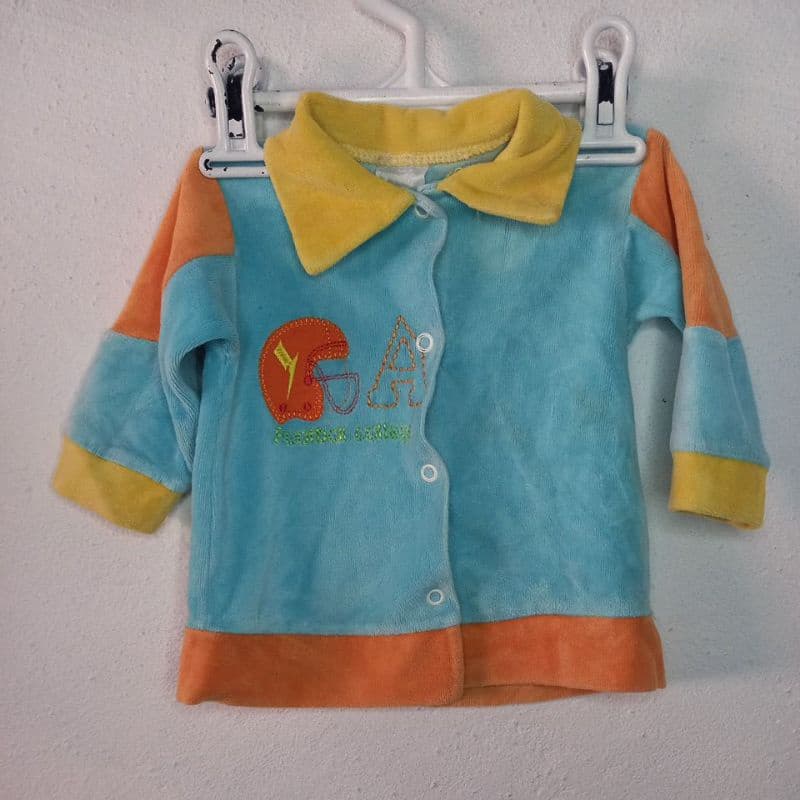 Casaco azul futebol americano usado