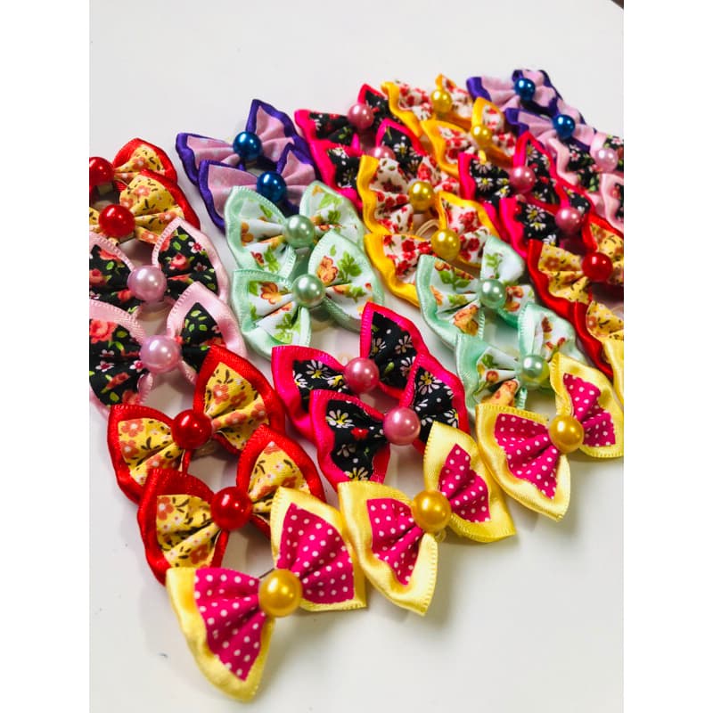 50 unidades lacinhos pet mix cores variadas grande cachorro, caes laço banho e tosa