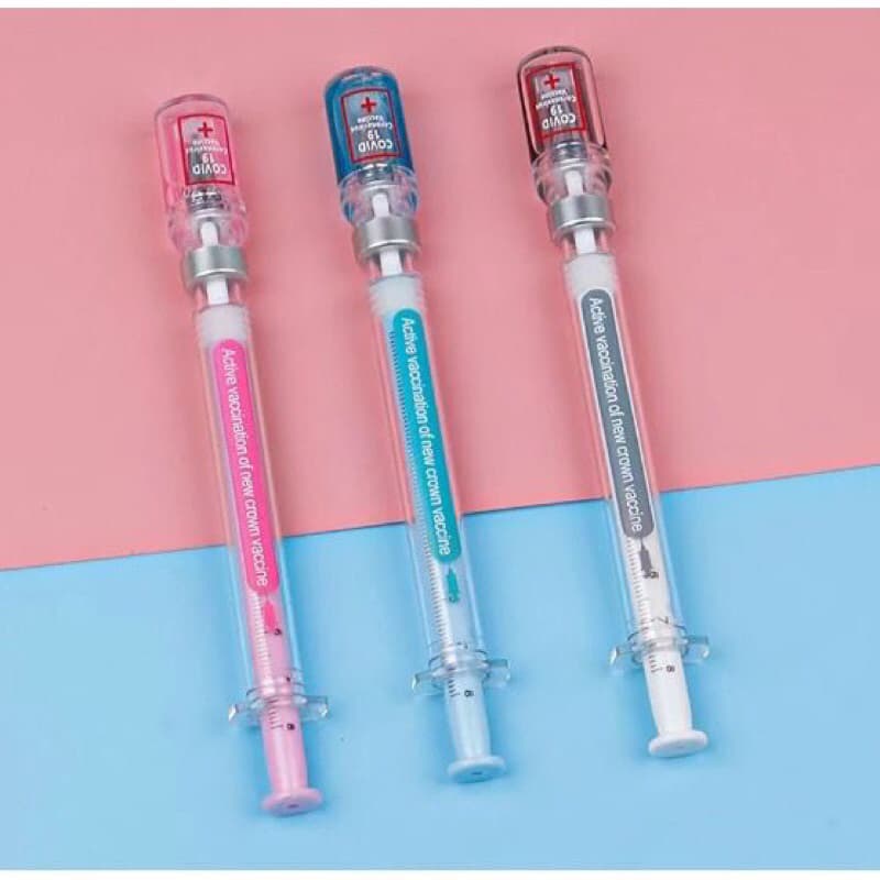 1 Caneta Seringa / escrita azul /