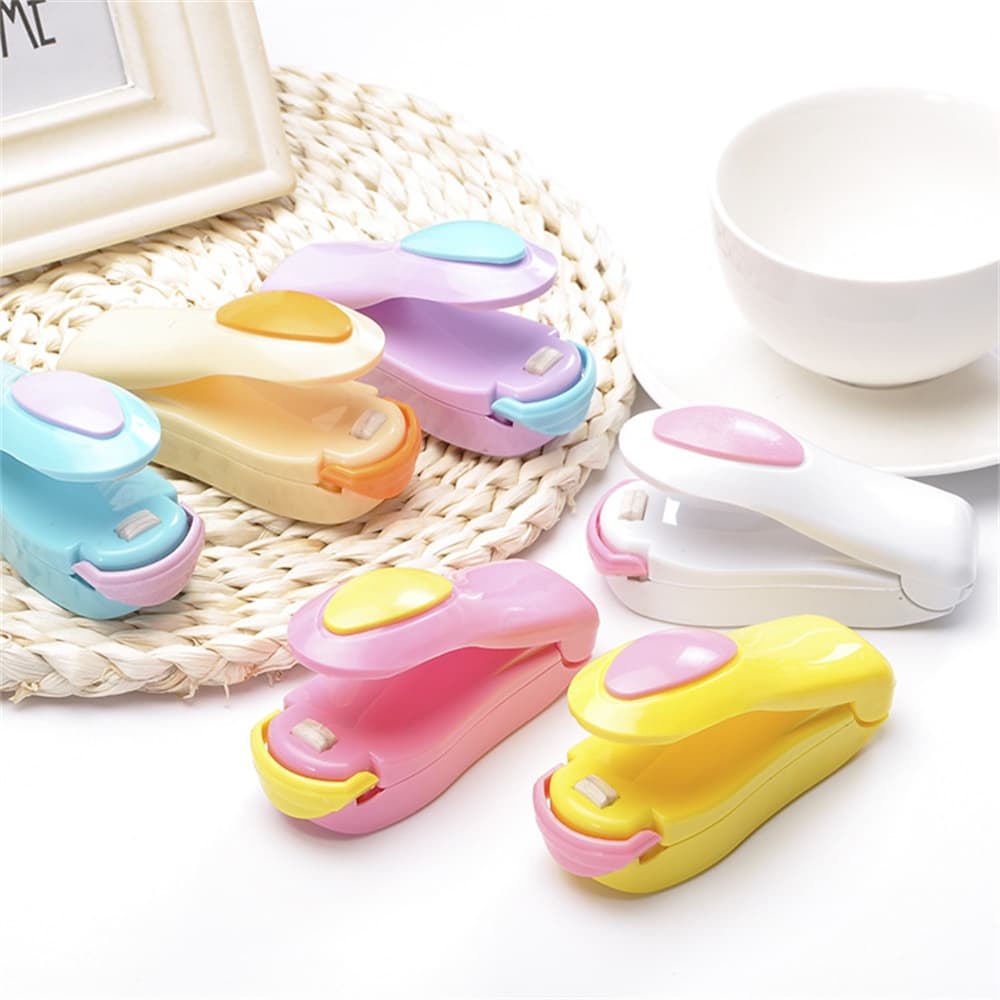 Mini Máquina Seladora a Pilha Colorida Com Imã de Geladeira Pratica e Rápida