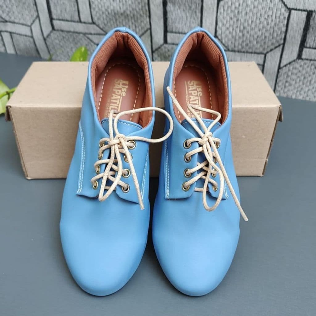 Sapato oxford azul bico redondo