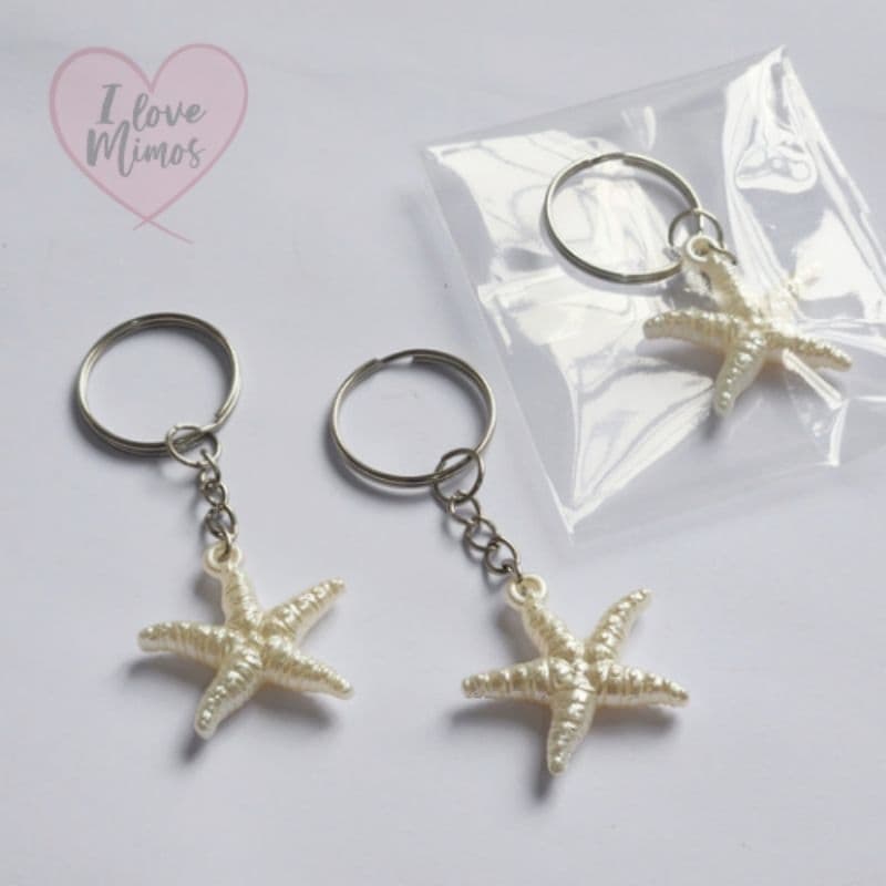20 e 25 Chaveiros Estrela do Mar Perolado 7cm. Embalados.