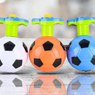 Brinquedo pião musical bola de futebol c/ lançador c/luz