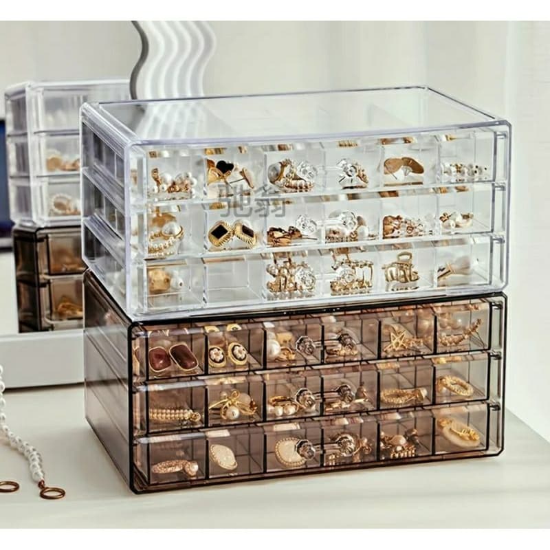 Caixa Organizadora de acrílico com três gavetas.