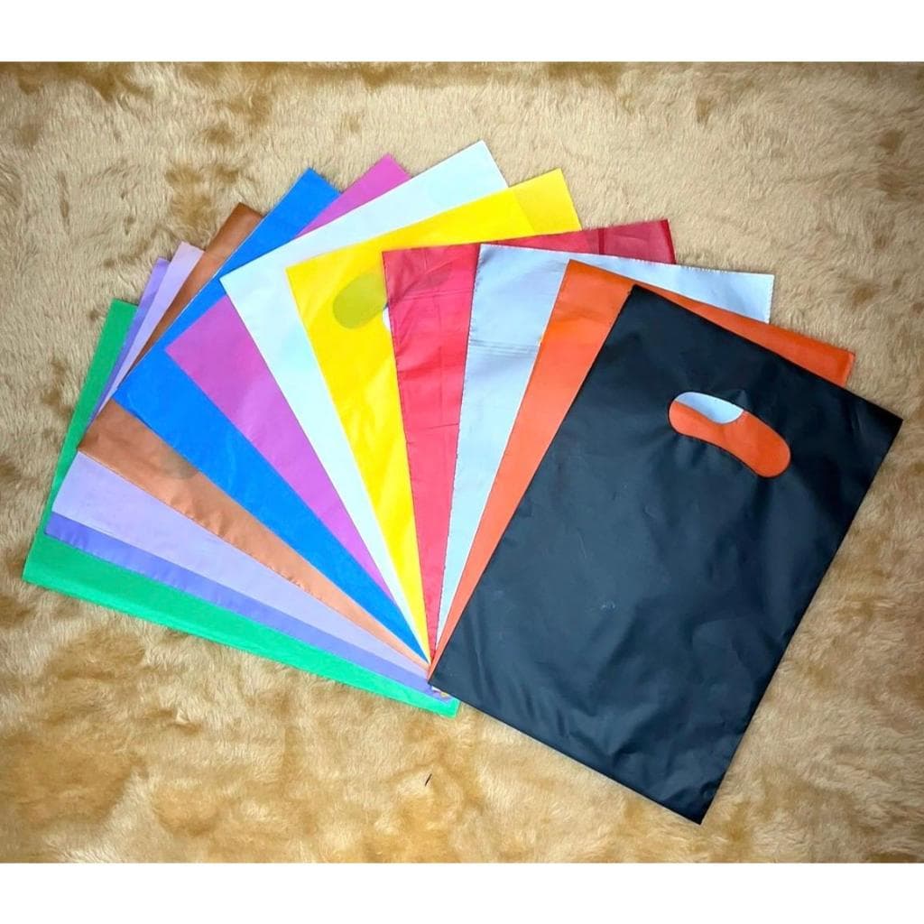 SACOLAS PLÁSTICAS - 20X30 - ALÇA VAZADA/BOCA DE PALHAÇO - LOJA / ATACADO