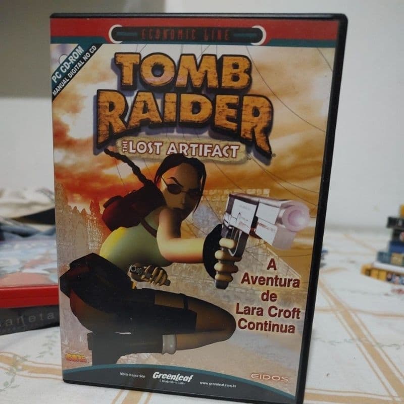 cd de jogo PC tomb raider the lost artifact,a aventura de Lara Croft continua .