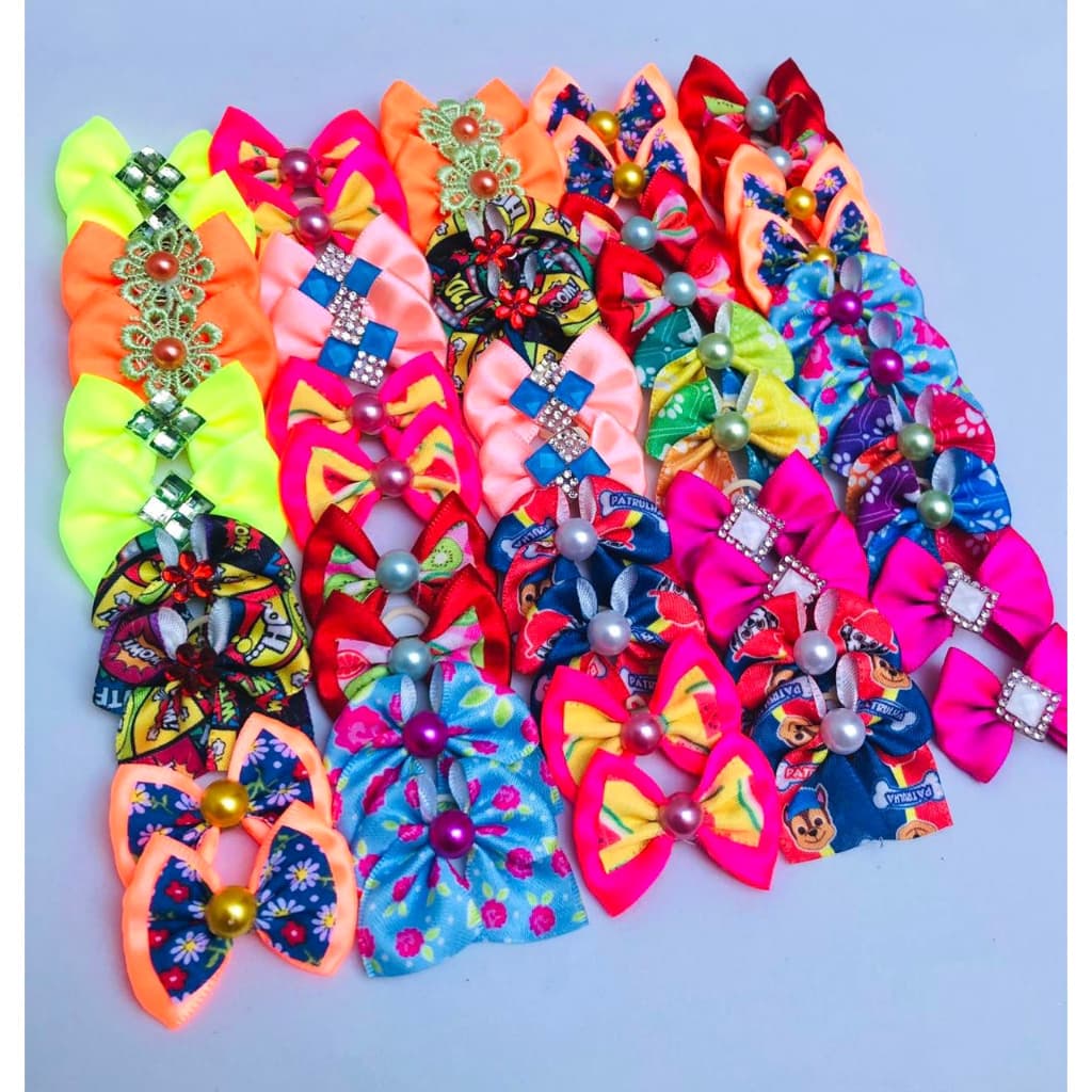 50 unidades lacinhos para pet cores variadas cachorro, caes laço banho e tosa