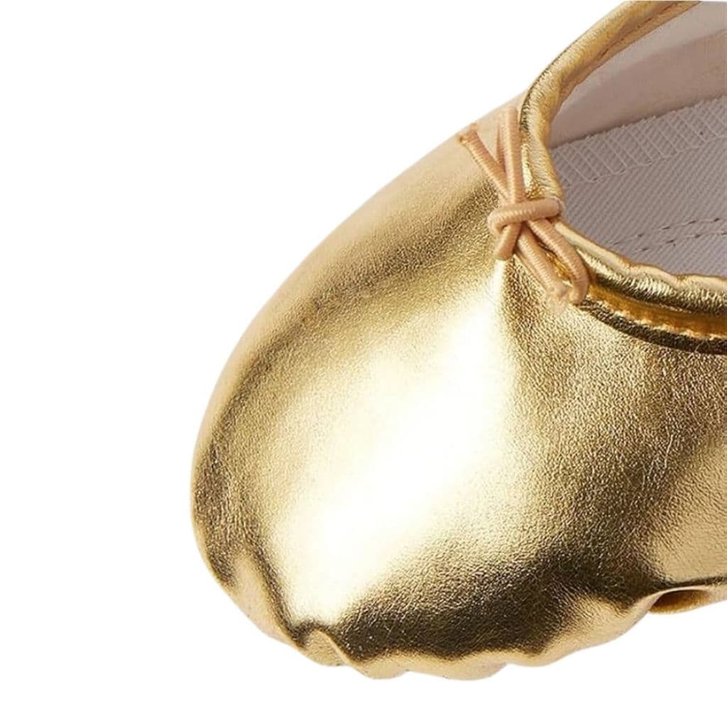 Sapatilha de ballet dourada em korino