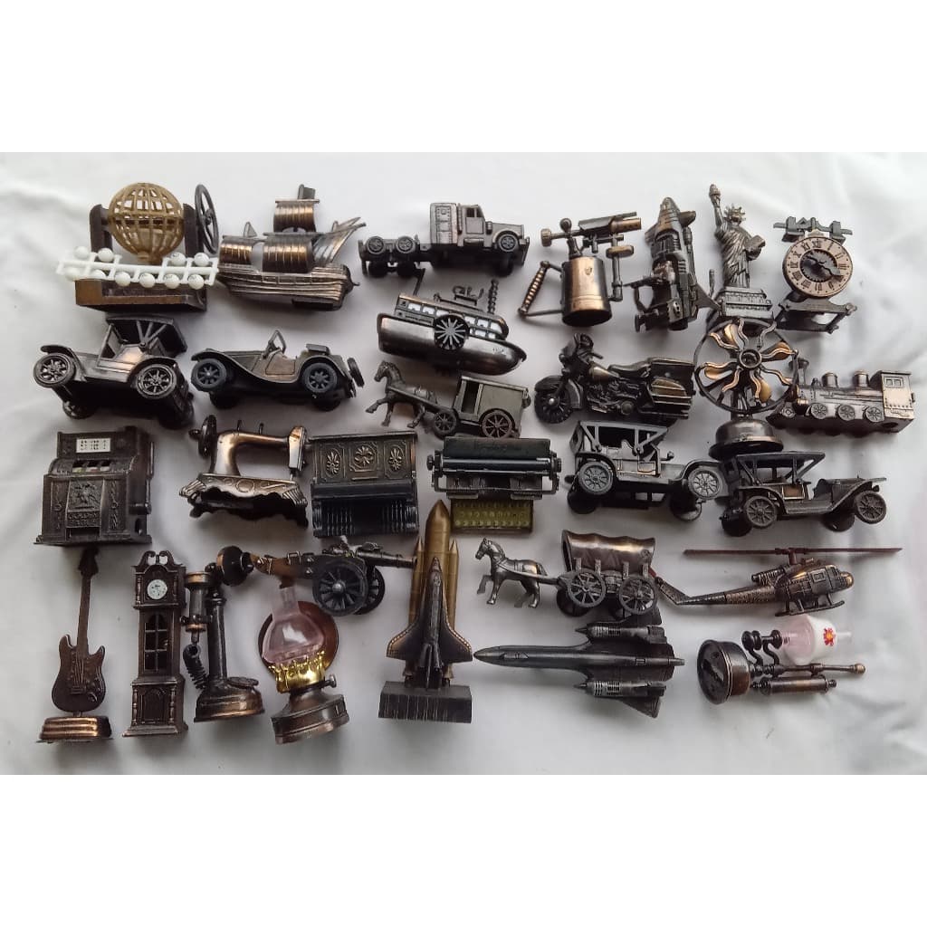 Apontador antigo em ferro diversos formatos - NA25