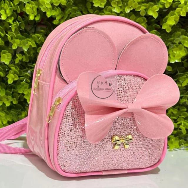 mochila infantil ,bolsa com brilho com bolso na frente ,orelhinhas da minnie e laço ENVIO RAPIDO ..