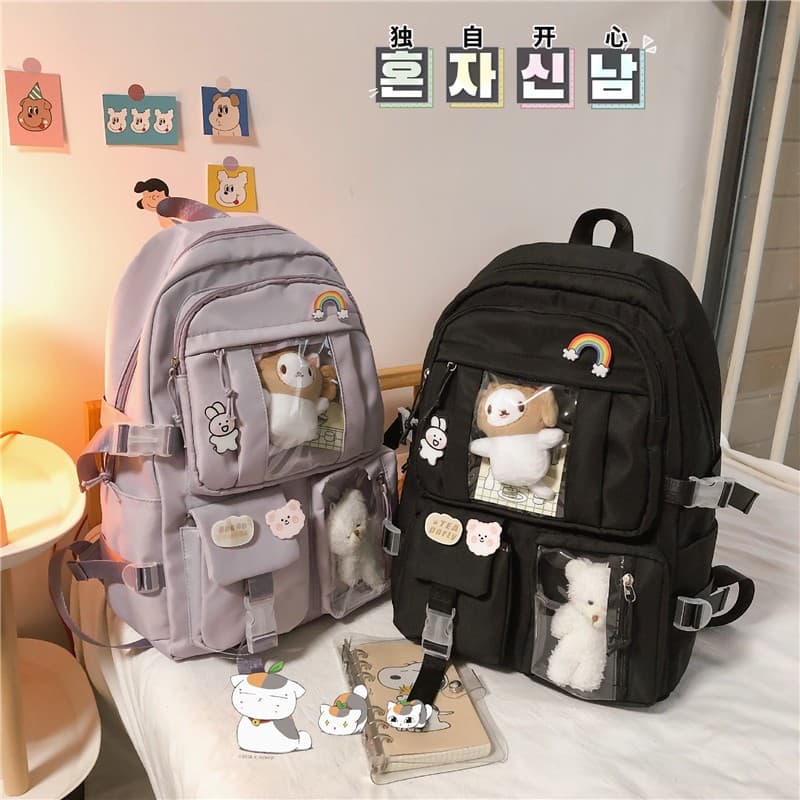 Mochila Feminina Escolar Passeio Coreano Grande Capacidade Com pingente de urso Mochila versátil popular nas redes