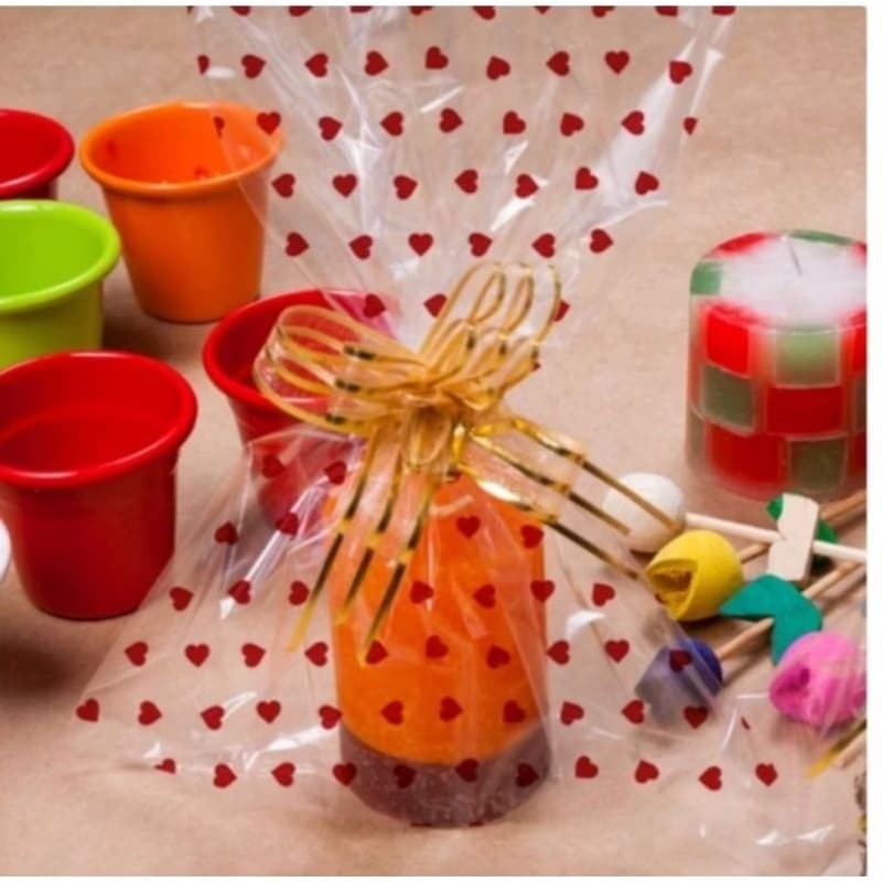 50 sacos de celofane transparente e decorado diversos tamanhos