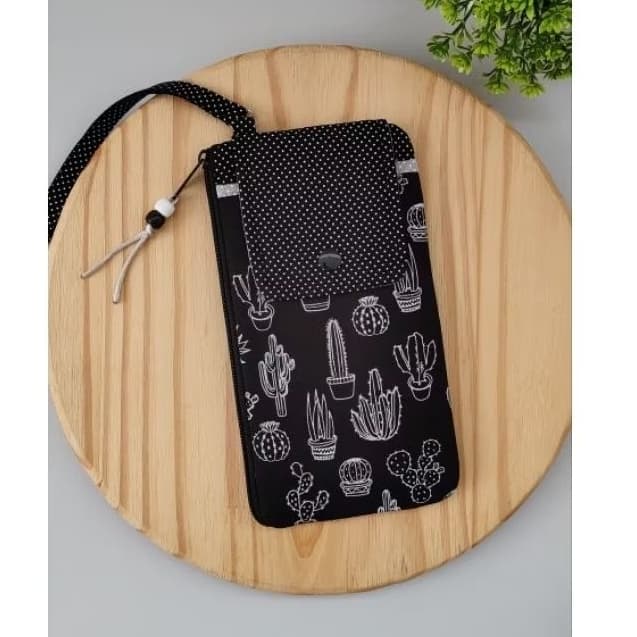 Carteira/Bolsinha de mão/Porta celular.