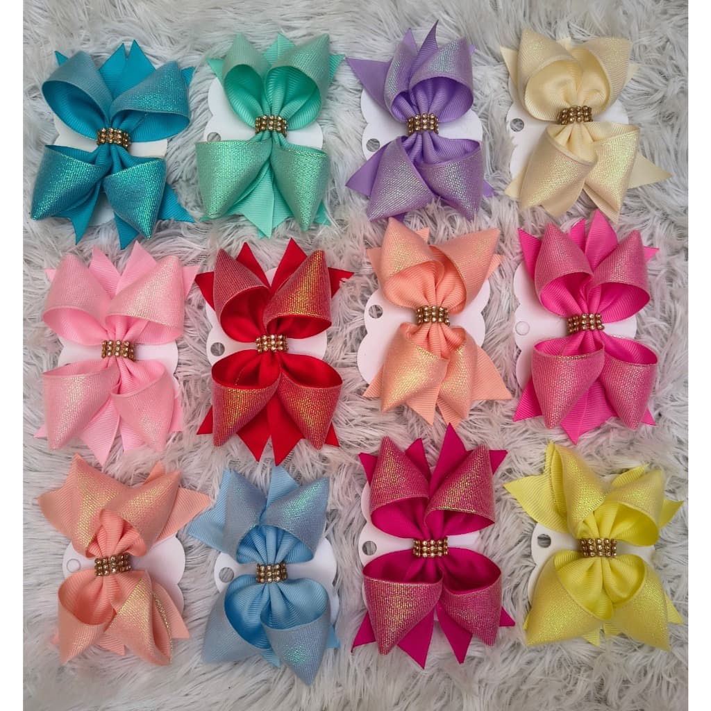 Kit com 12 Laços Infantis Estilo Boutique – Elegância e Cor para Cada Dia!