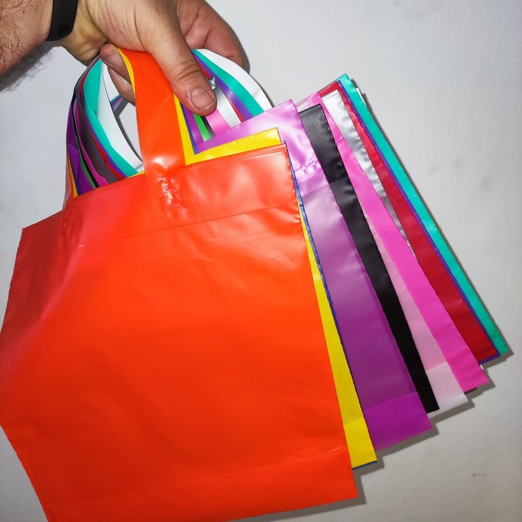 kit com 25 Sacolas plásticas Alça Fita 27x30  em alta densidade 15 micras de espessura, para lojas