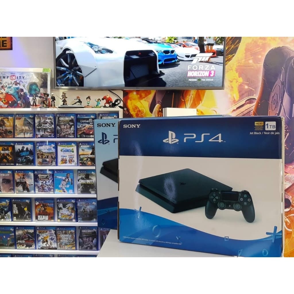 Playstation 4 slim 500gb +2 controles  +1 jogo + garantia +nota fiscal (não destrava)