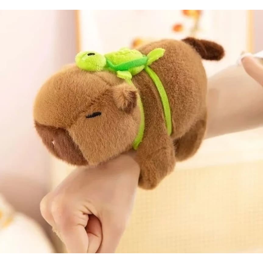 Pulseira de Pelúcia Capivara Fofa Brinquedos Bate Enrola Com Mochilinha Tartaruga com cauda girando