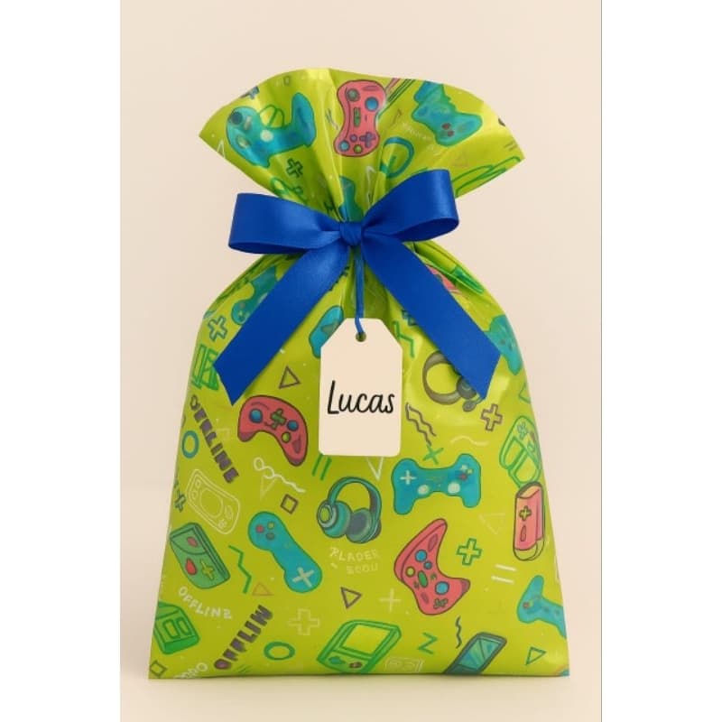 50 sacos para  presentes metalizados vários tamanhos e estampas variadas infantil e neutro