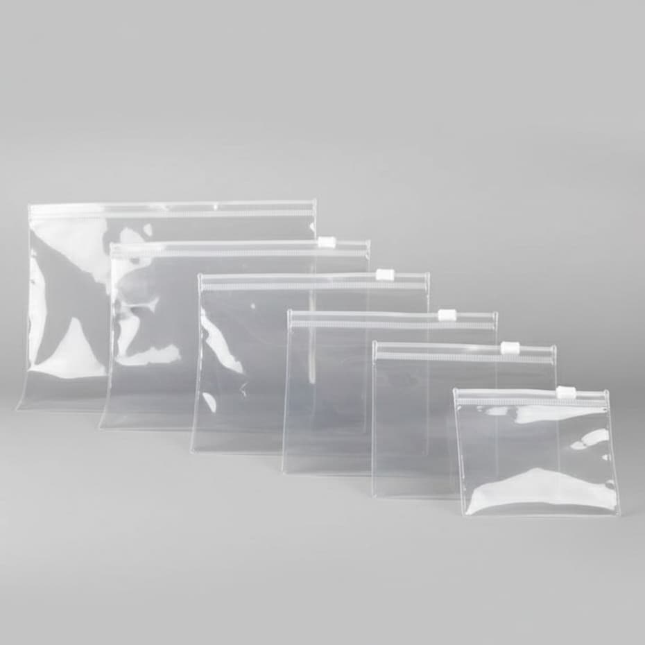 Kit 50 Mini Necessaire Transparente PVC Zíper - Multiuso (Viagem, Higiene, Make)