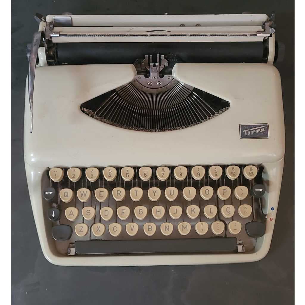 Máquina de escrever Tippa - Triumph - Grunding organisation. Preço de desapego.