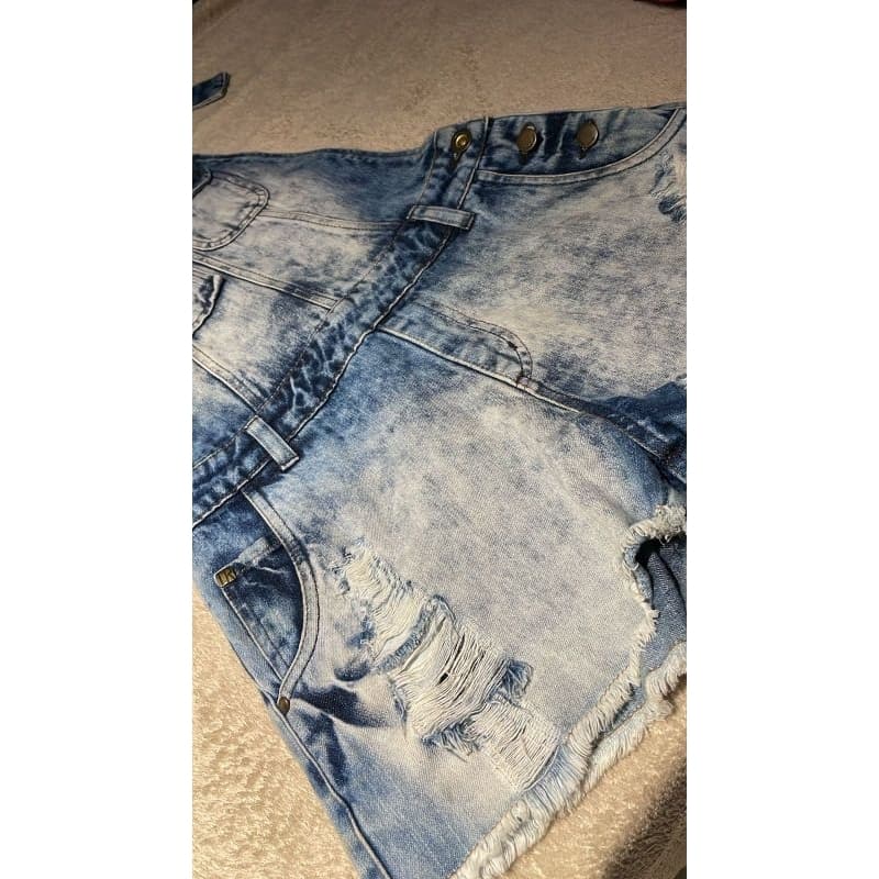 Jardineira jeans bolsos PP verao