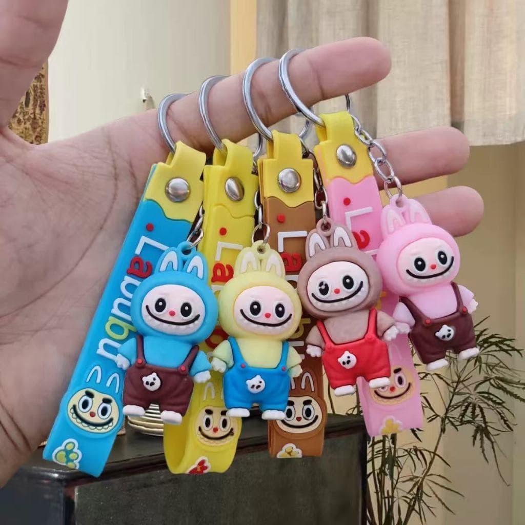 Chaveiro Boneco Happy Cores Vibrantes e Alegria no seu Dia Presente