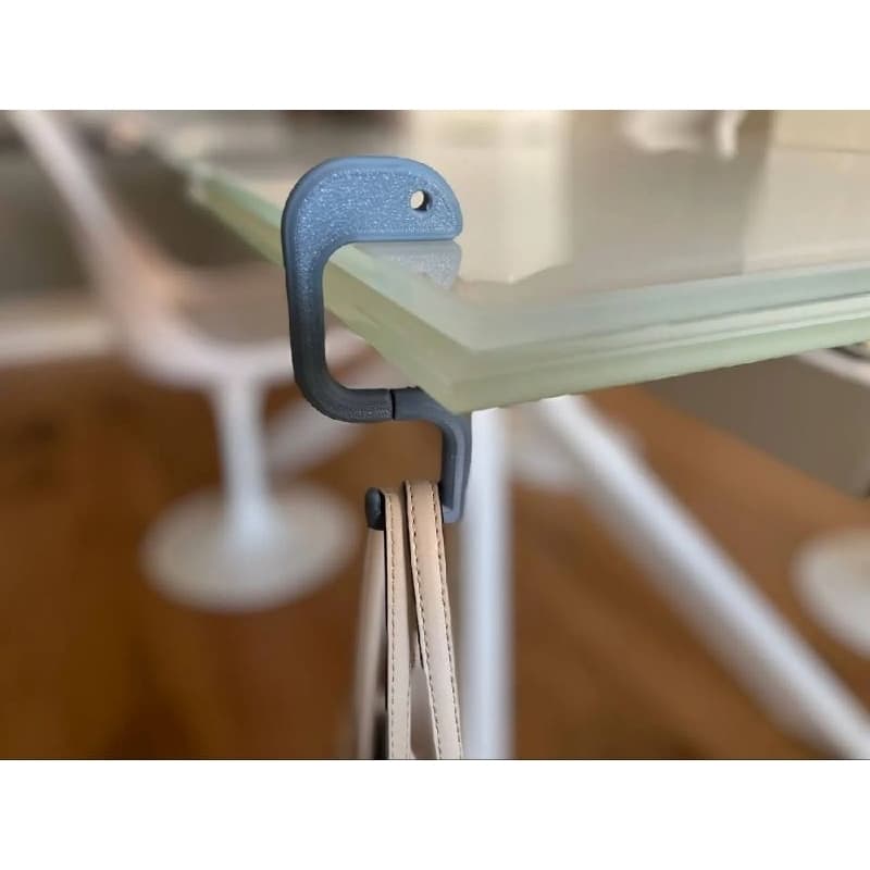 Gancho de mesa para bolsas serpente dobrável