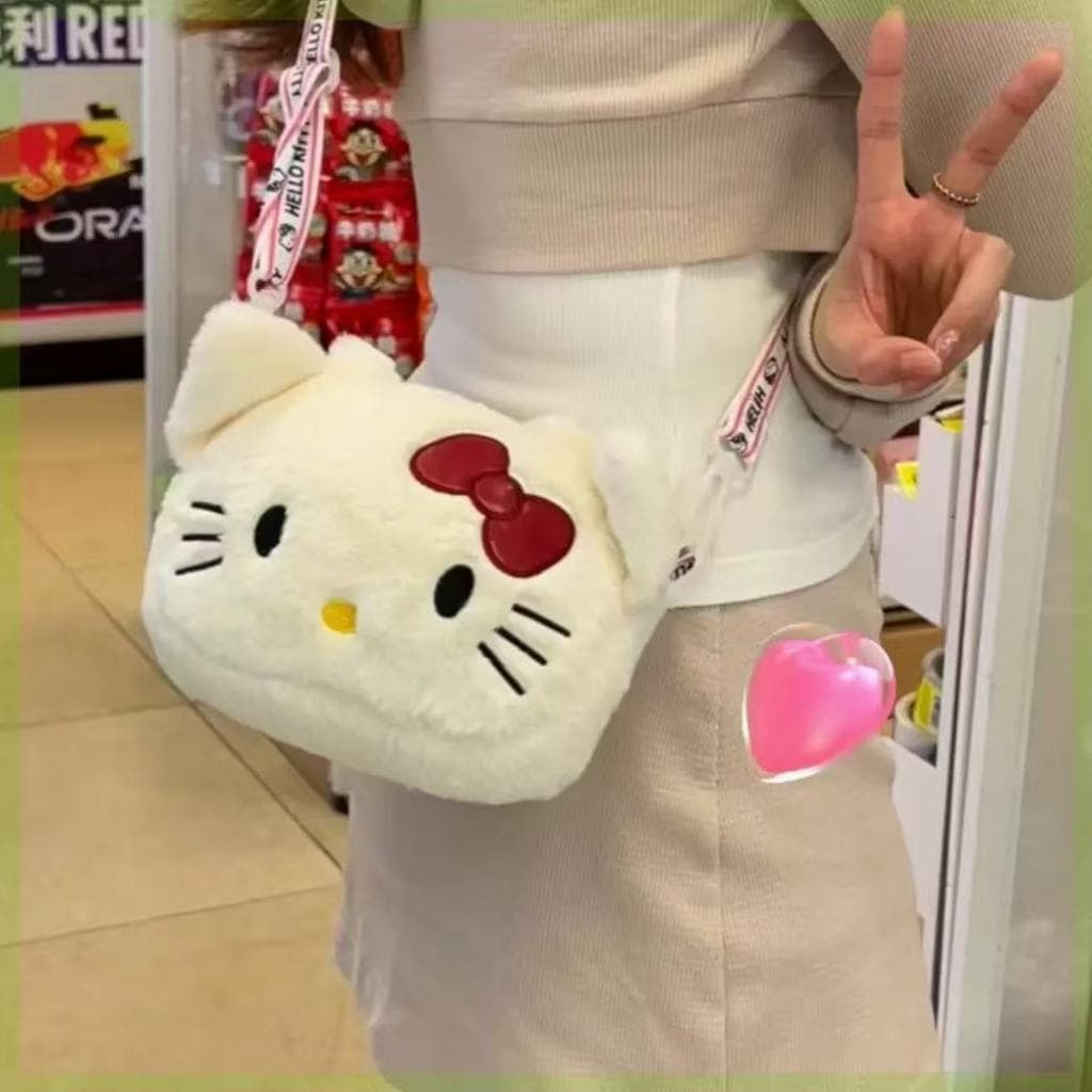 bolsinha transversal com alça da hello kitty em pelúcia