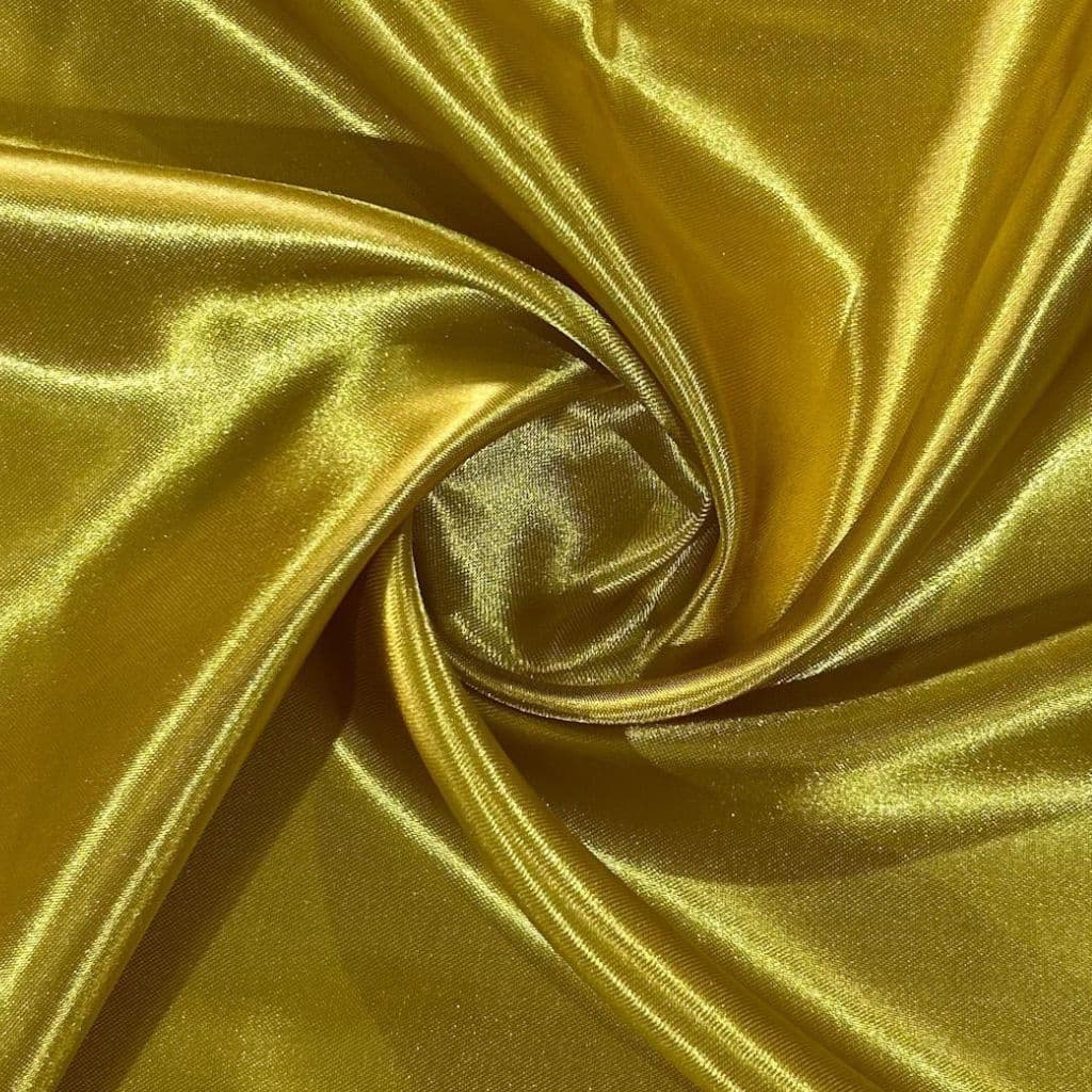 Tecido Cetim Dourado Premium no Metro – Elegância que Valoriza suas Criações