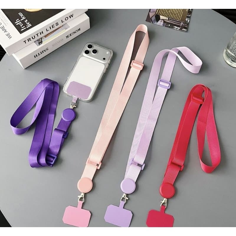 Alça de telefone removível e reforçada que pode ser pendurada na diagonal.