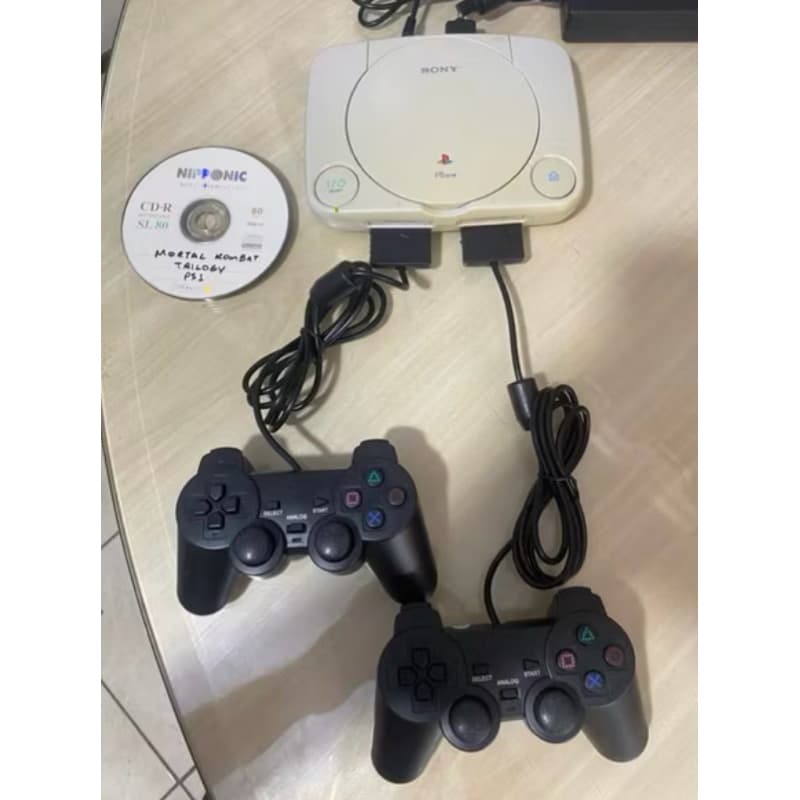 Ps One Acompanha 2 controles Audio E Video e Fonte + 5 Jogos