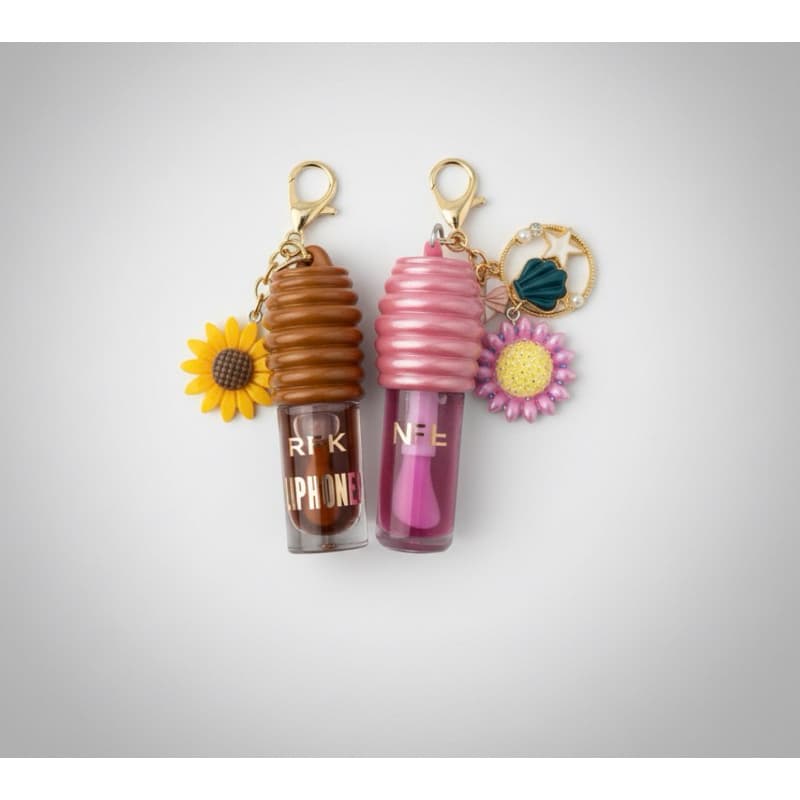 2 LIP GLOSS MEL E MORANGO COM CHAVEIROS VARIADOS