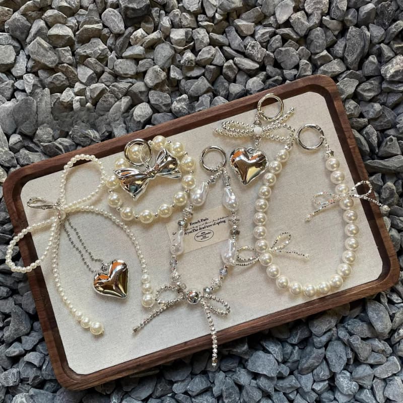 Bonito Bowknot Amor Coração Pérola Telefone Charme Cinta Pingente Para iPhone Samsung Accessrioes Saco Chaveiro Mulher C