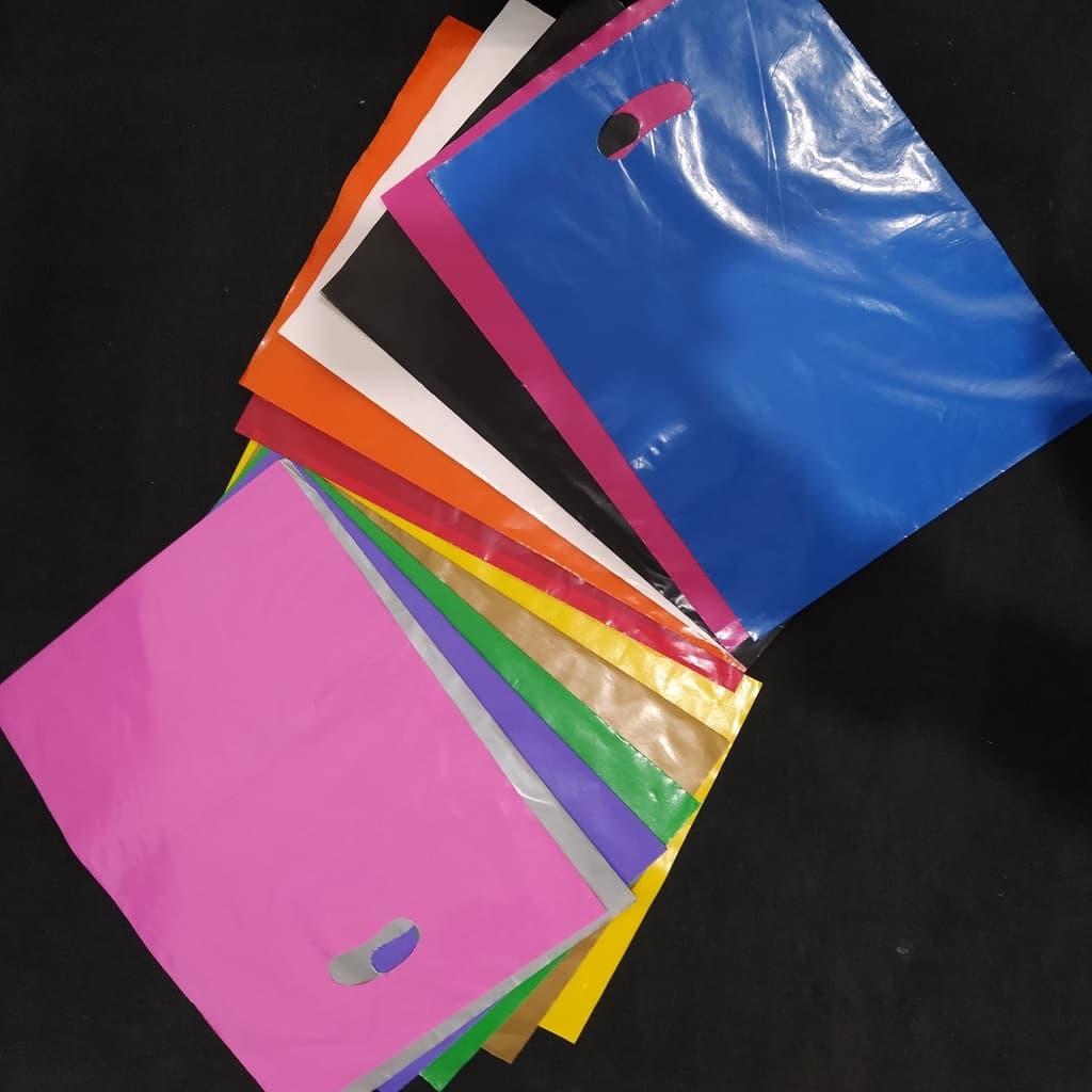 25 Sacolas Plásticas alça Boca De Palhaço  , tamanhos 20x30 / 25x35 / 30x40 / 40x50, Escolha o seu