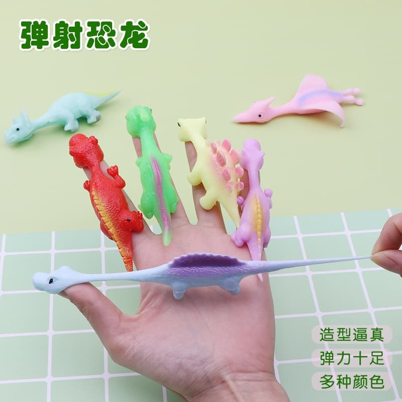 【3pcs】Dinossauro Catapulta  Divertido Lançamento de Dardos de Dedo Descompressão Borracha Macia