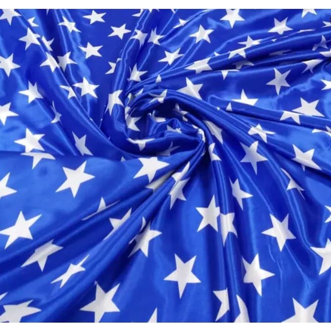 50cm x 1,50m - Tecido Cetim Estampado Estrelas Mulher Maravilha para Roupas Fantasias Festas de Decoração Oferta