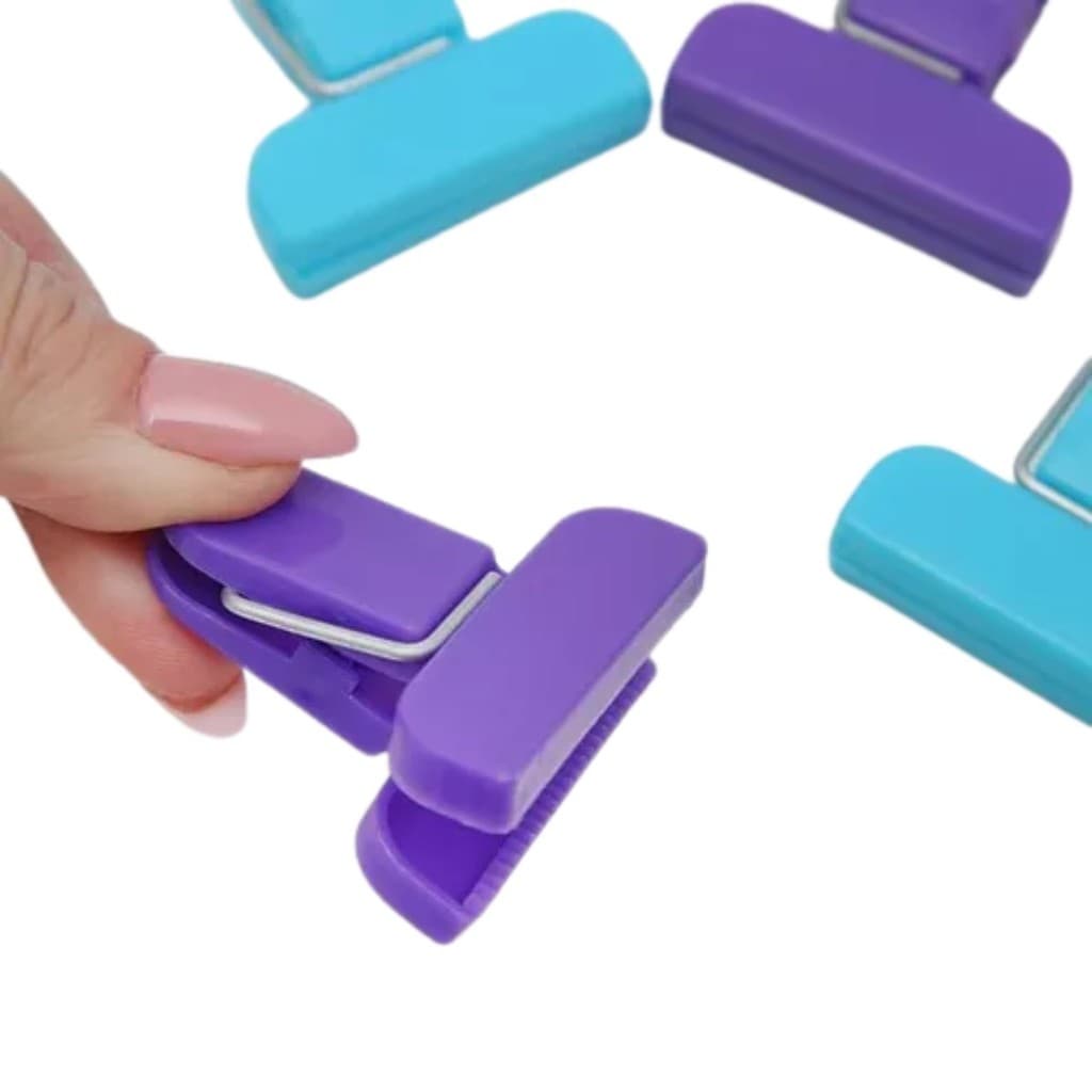 Kit 4 prendedor de embalagens Plástico 3,8 cm x 4 cm.