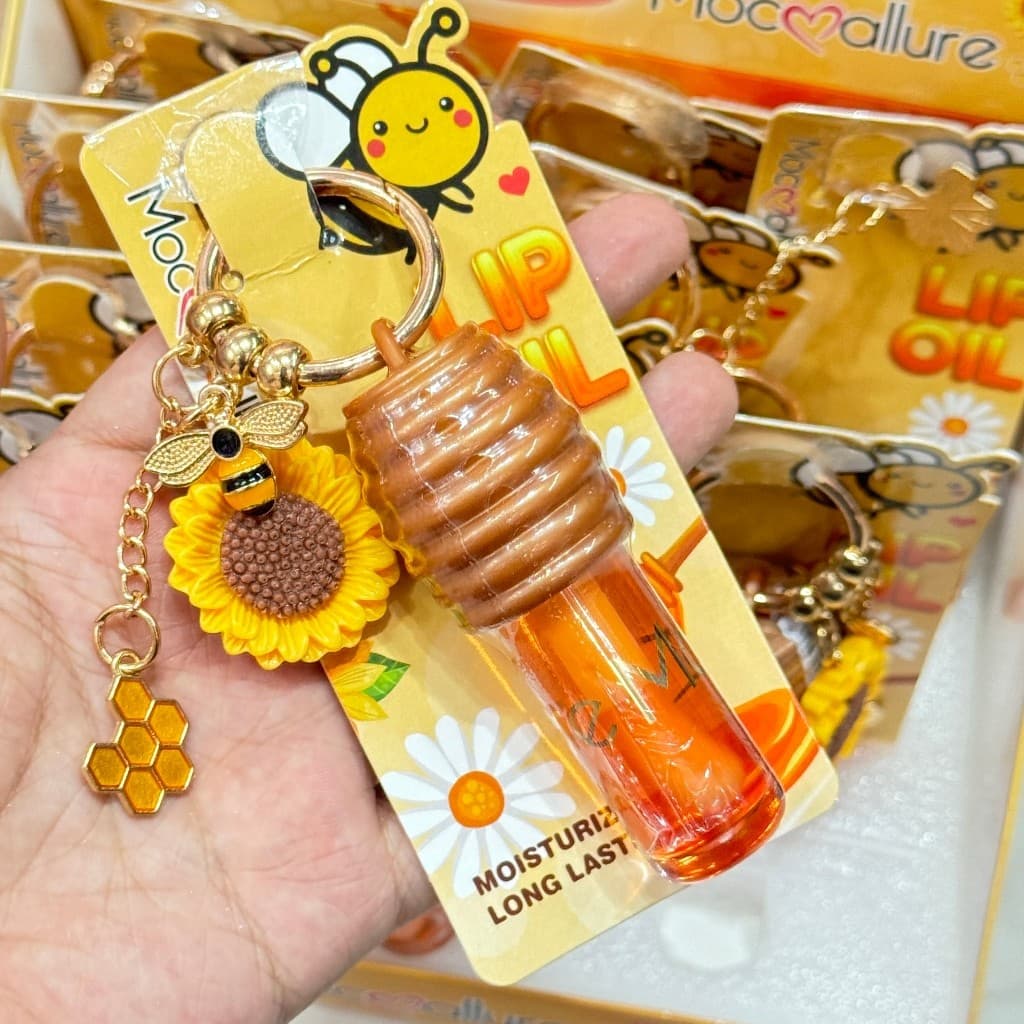Óleo labial de mel com essência hidratante transparente, com chaveiro, novo design.