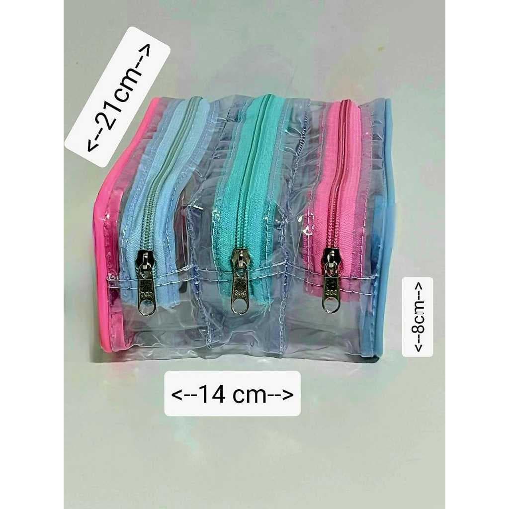 ESTOJO TRANSPARENTE COM FRISOS E ZIPER COLORIDOS CONTENDO 3 REPARTIÇÕES