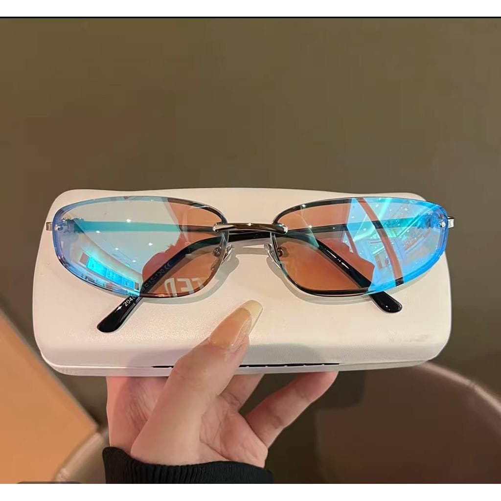 Óculos de sol femininos sem aro e formato olho de gato em metal 599
