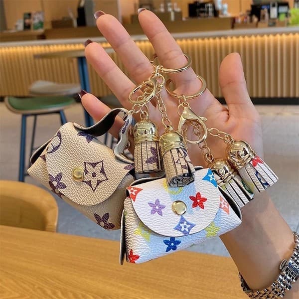 Mini chaveiro fofo de bolsa de armazenamento para troca de couro