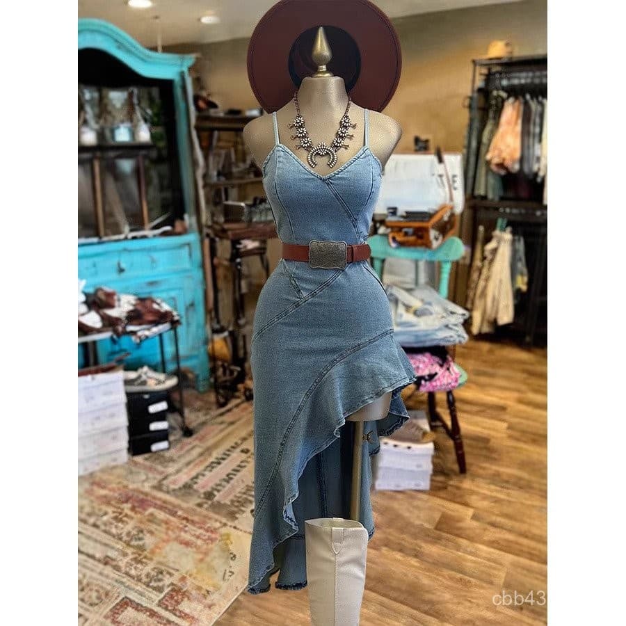 2025 Vestido jeans feminino europeu americano com saia inclinada Unilateral