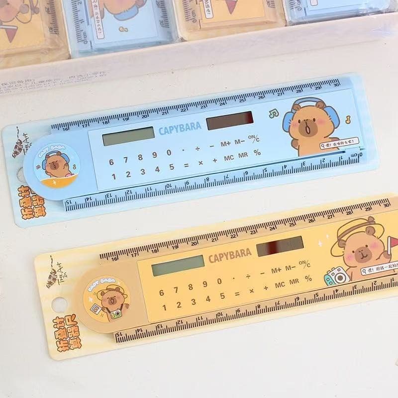 Régua Retrátil com Calculadora Solar Capivara Fofa – 30cm com Moldes Geométricos Criativos