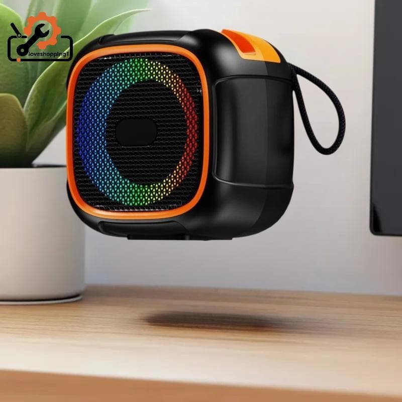 [LOV] Mini Alto-Falante Portátil Com Suporte Para Telefone , Luzes RGB , Super Bass E Tempo De Reprodução De 10 Horas Vi