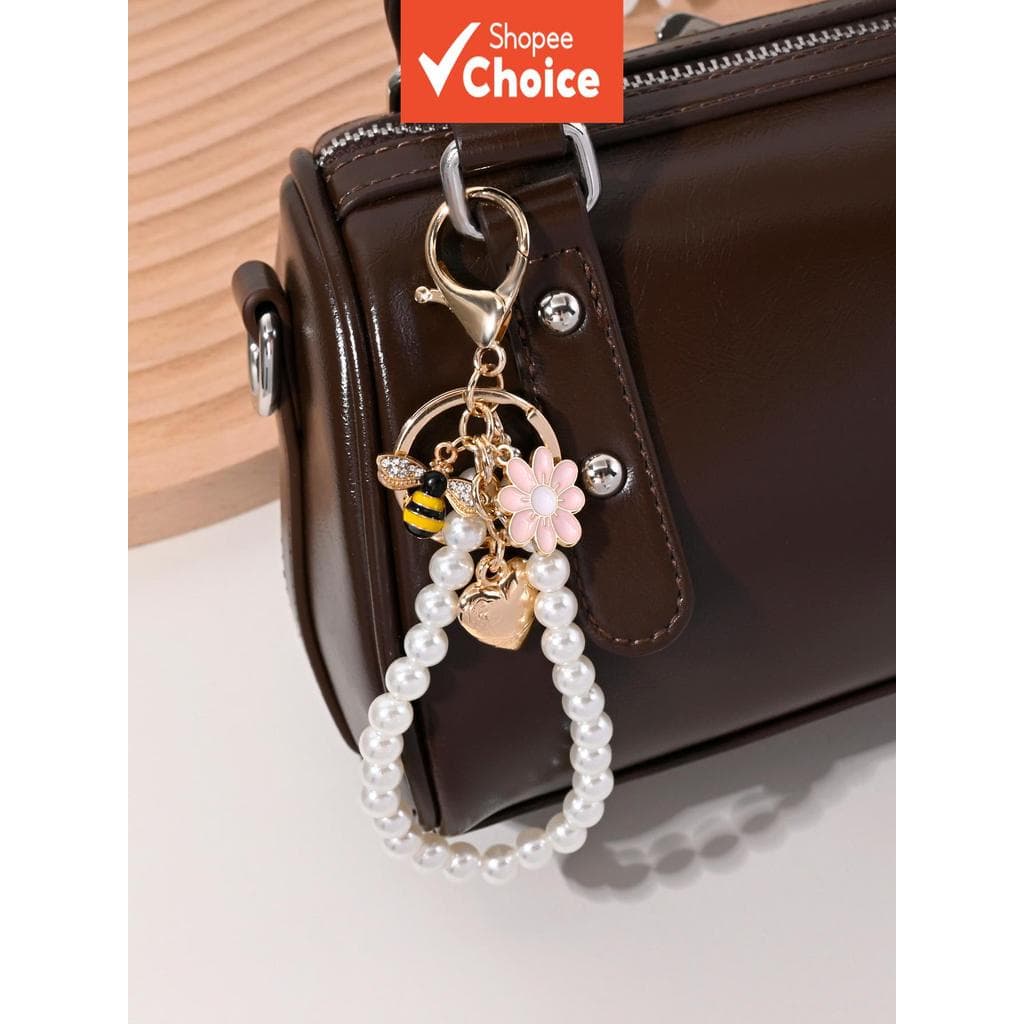  Elegante e versátil chaveiro de pulseira com pérolas artificiais em formato de coração, abelha e margarida, ideal para