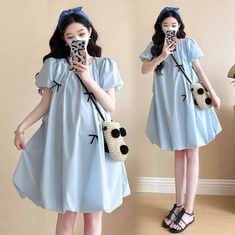 Vestido de maternidade Design solto botão arco vestido pequeno doce saia de manga curta