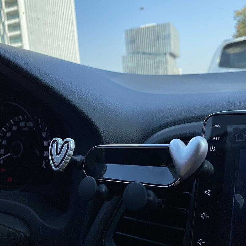 Bump coração Smiley Face suporte do telefone do carro saída de ar gravidade Anti-shake fixo navegação do carro dos desen