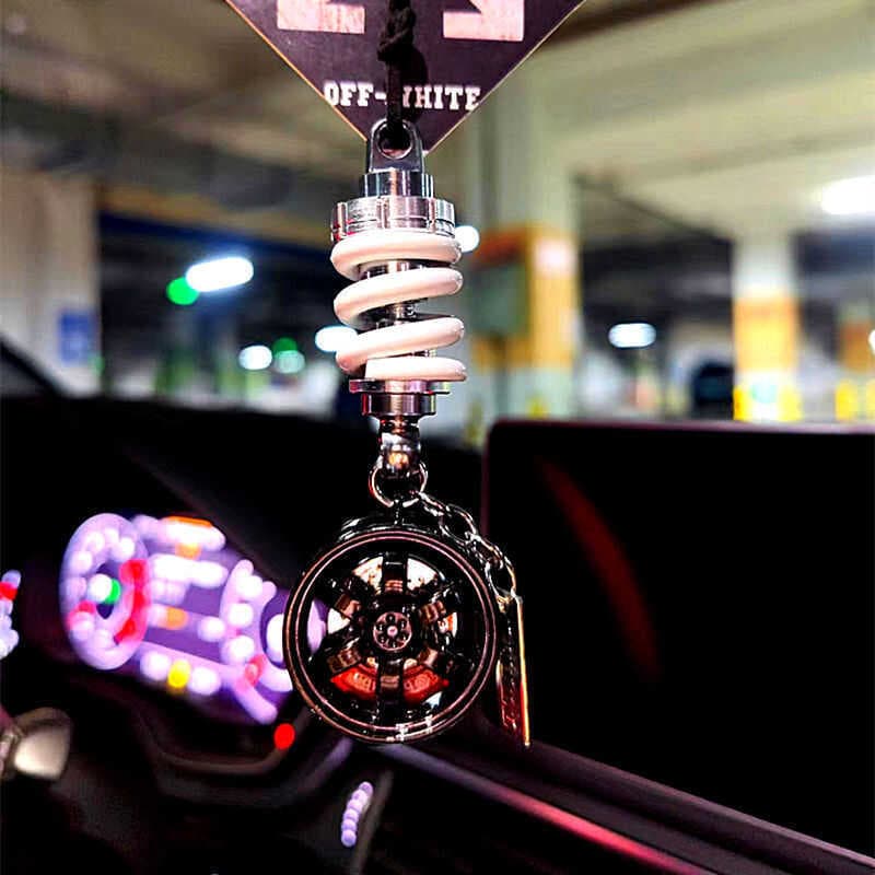 Pingente de carro roda Universal textura de Metal amortecedor ornamentos de carro Interior masculino espelho retrovisor 